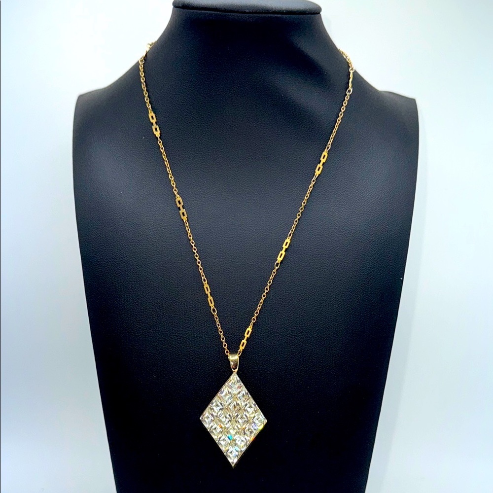 Sparkly rhinestone diamond shape pendant and gold tone chain statement bold fun